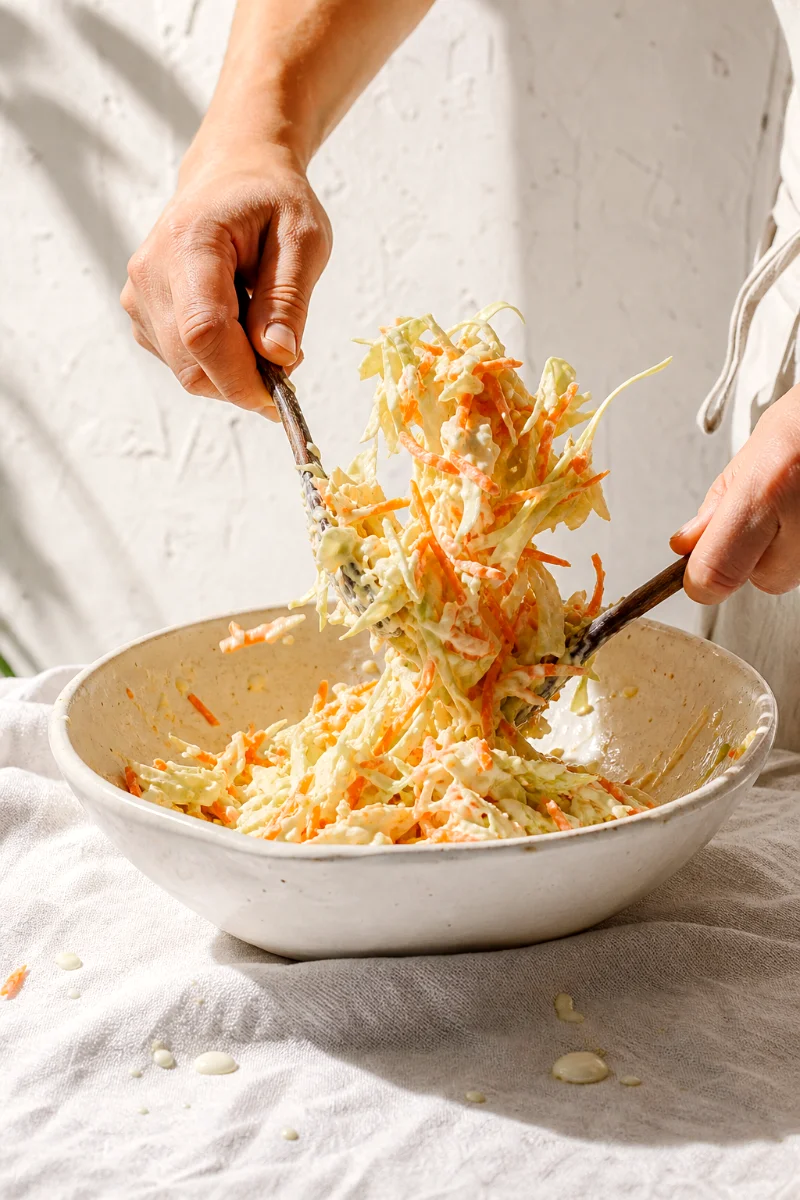 creamy-summer-coleslaw-tossing-process