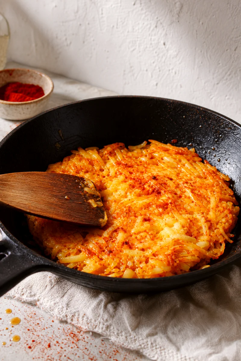 cheesy-potato-pancake-cooking-process-skillet