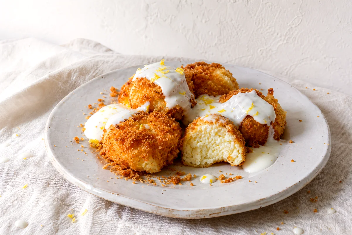 hungarian-cottage-cheese-dumplings-lemon-yogurt-sauce-featured
